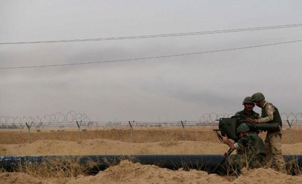 Kurdyjscy bojownicy walczący z IS w Iraku