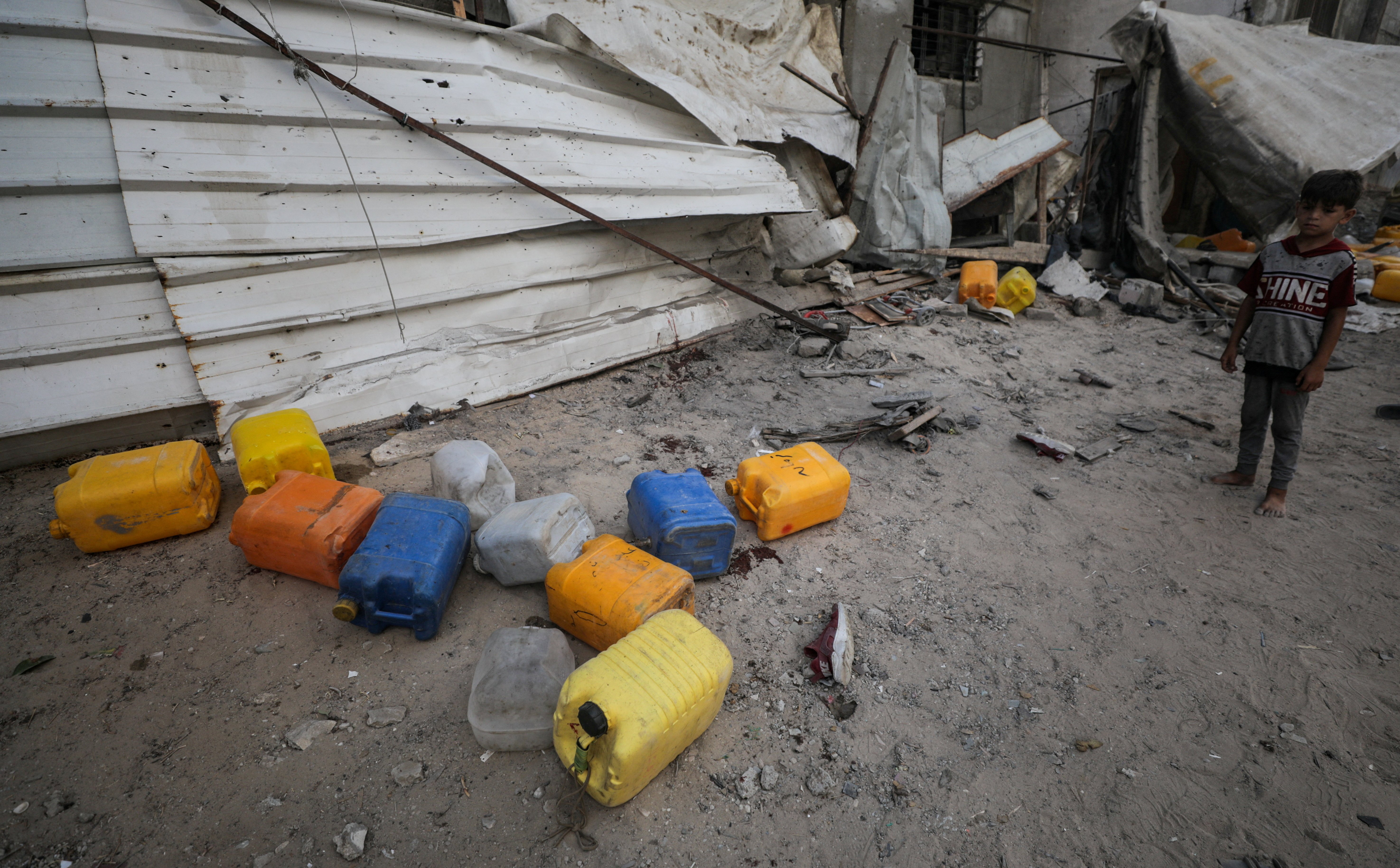 A rocket hit children carrying water in the Gaza Strip. Israel calls it an "emergency."