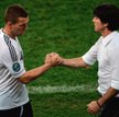 Lukas Podolski, Joachim Löw: męski uścisk dłoni