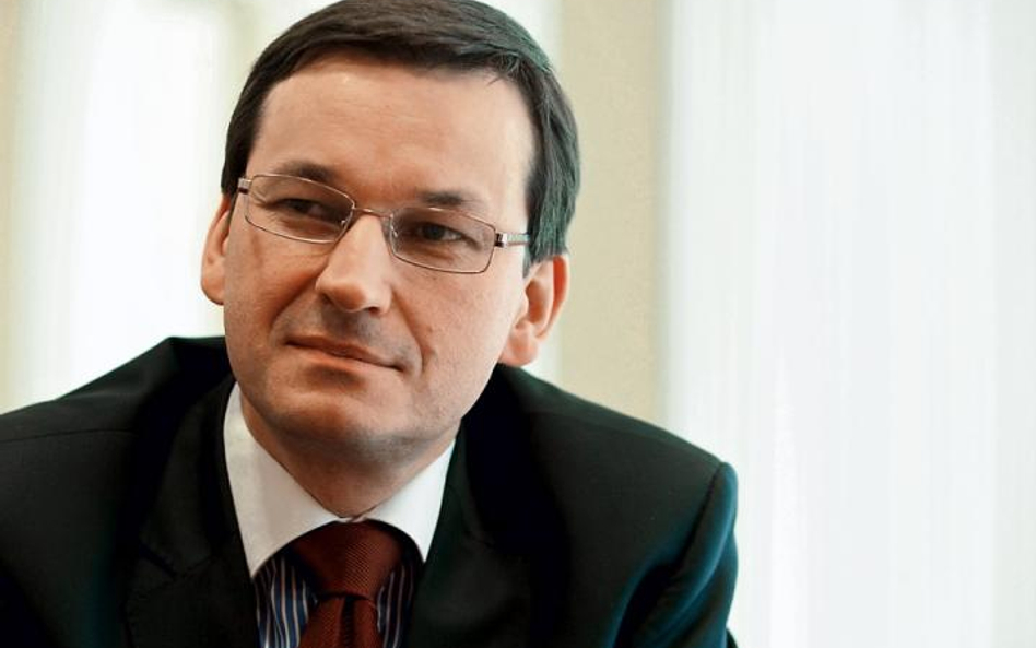 Mateusz Morawiecki, prezes BZ?WBK, zapowiada, że przygotowania do połączenia z Kredyt Bankiem toczą 