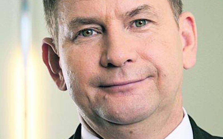 Dariusz Lubera, prezes grupy Tauron Polska Energia (u góry), oraz Herbert Wirth, prezes KGHM Polska 