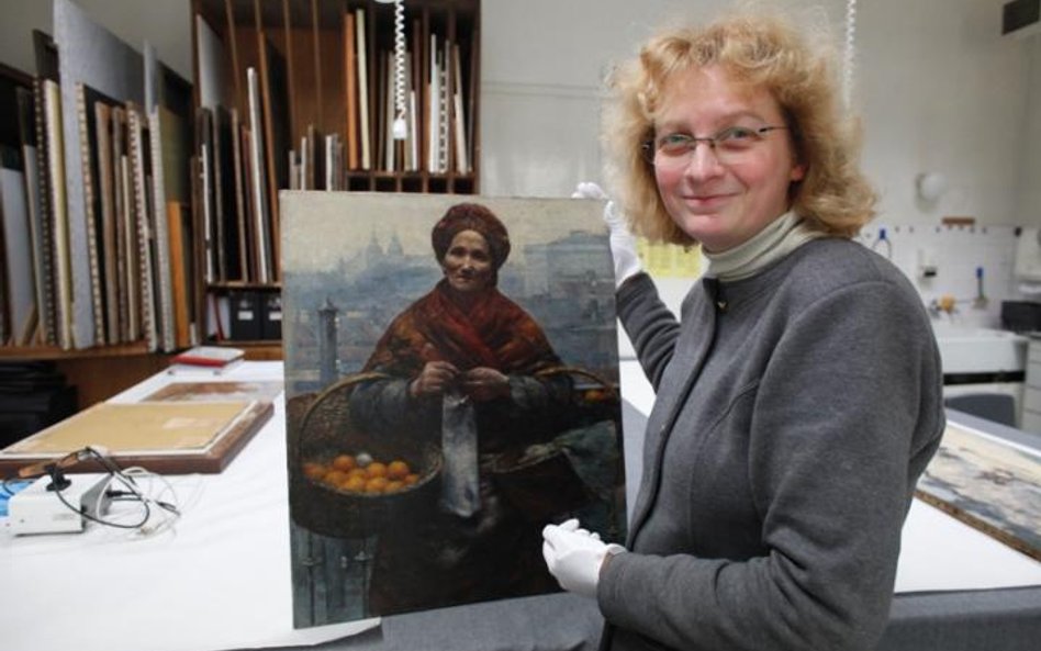 Anna Lewandowska, konserwator Muzeum Narodowego, z Pomarańczarką Aleksandra Gierymskiego