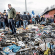 Wicepremier Matteo Salvini (na zdjęciu w 2018 r. w romskim obozowisku w Rzymie) zapowiadał wydalenie