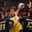 Denis Buntić z Vive w walce z rywalami z THW Kiel
