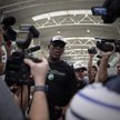 Czy Dennis Rodman (na zdjęciu konferencja na lotnisku w Pekinie) pomógł uwolnić Amerykanina skazaneg