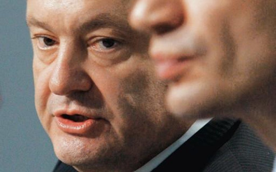 Petro Poroszenko ma największe szanse w wyborach prezydenckich (z prawej Witalij Kliczko)