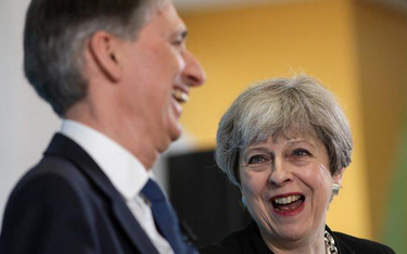 Premier Theresa May chce twardego brexitu, minster finansów Philip Hammond – w wersji soft