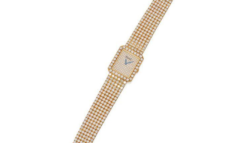 Złoty zegarek firmy Piaget wysadzany diamentami - 12 - 18 tys. dolarów.