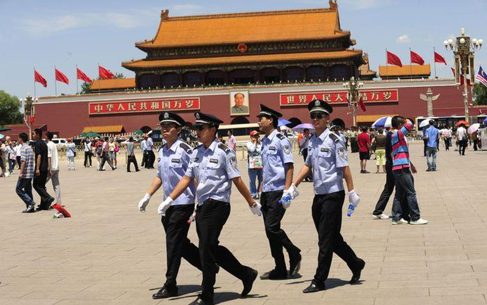 Policjanci na placu Tiananmen