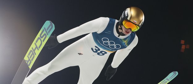 Zimowe Igrzyska Olimpijskie - Mediolan i Cortina d’Ampezzo 2026. Polak Kacper Tomasiak podczas konku