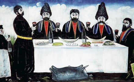 Gruzin uczy się przy stole