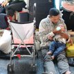 A Chicago police station waiting room full of immigrants