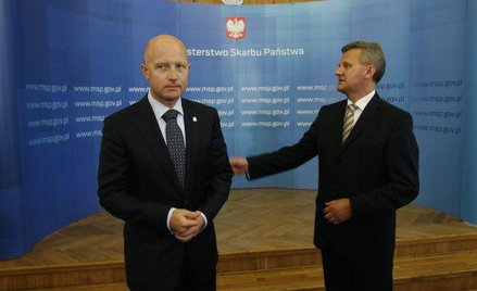 Prezes PZU Andrzej Klesyk (na zdjęciu z lewej) i minister skarbu Aleksander Grad