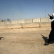 Irak. Matka witająca syna zwolnionego z amerykańskiego więzienia