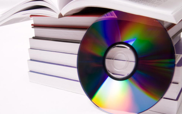 Jaka stawka VAT dla sprzedaży zestawów książek z płytami CD