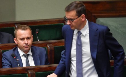 Odchodzący minister Michał Cieślak i premier Mateusz Morawiecki